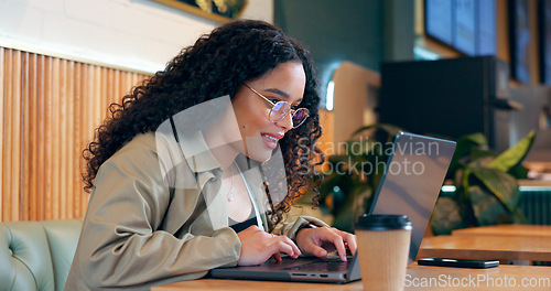 Image of Cafe, thinking and woman with a laptop, typing and connection with inspiration, ideas and planning. Person, freelancer and entrepreneur with a pc, coffee shop or project with company website or email