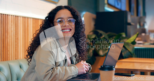 Image of Woman, portrait and laptop in coffee shop for remote work, research or networking for business with smile. Face, person and happiness with technology in cafe for copywriting, internet and freelancer