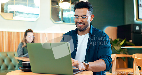 Image of Coffee shop, internet and man with a laptop, typing and connection with website, startup and planning. Person, freelancer and entrepreneur with a pc, cafe or project with copywriting or digital app