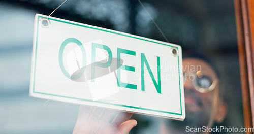 Image of Man, business owner or open sign on door in coffee shop or restaurant for service or advertising. Ready, start or entrepreneur holding board, poster or welcome for message on window in diner or cafe