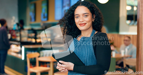 Image of Cafe, woman and business owner on tablet for restaurant sales, online management or customer service at door. Portrait of entrepreneur, waitress or barista with digital technology for coffee shop