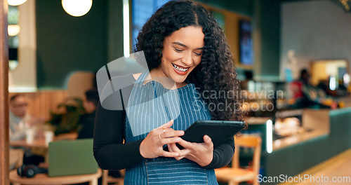 Image of Coffee shop, happy waitress and tablet of restaurant sales, online management or reading customer service reviews. entrepreneur, woman or barista scroll on digital technology for cafe menu or website