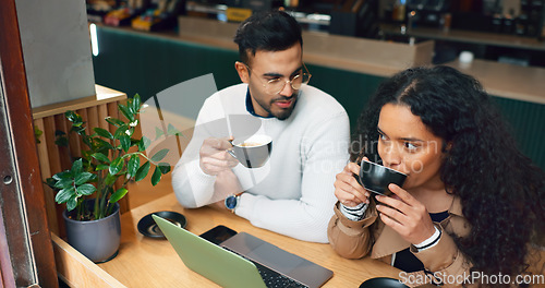 Image of Coworkers, laptop and remote work with coffee, working and technology for business, strategy and planning. Cafe, meeting and brainstorming for project, woman and man in partnership, listening and job