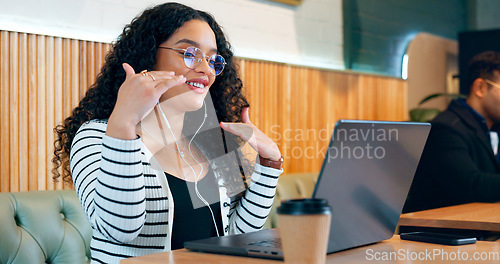 Image of Woman, computer and video call in cafe for remote work, online meeting and planning or networking for job opportunity. Freelancer talking on laptop for virtual discussion at restaurant or coffee shop