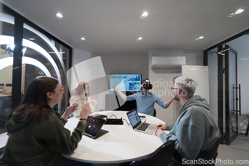 Image of A diverse group of businessmen collaborates and tests a new virtual reality technology, wearing virtual glasses, showcasing innovation and creativity in their futuristic workspace