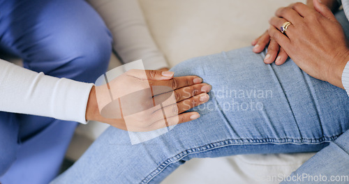 Image of Physiotherapist, hands and closeup for knee pain, helping and care for recovery in clinic consultation. Doctor, nurse and patient with joint injury in hospital assessment, check or exam for wellness