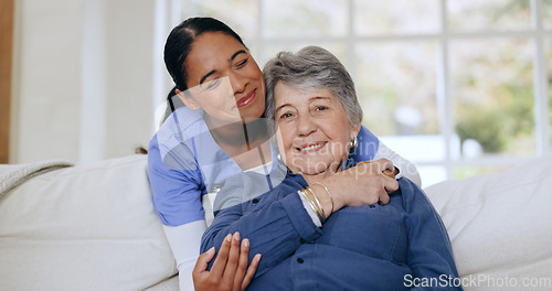 Image of Senior woman, nurse and hug on sofa, retirement home and caregiver for support, smiling and love. Friendly, empathy and elderly for healthcare, wellness and worker for patient, respect and nursing