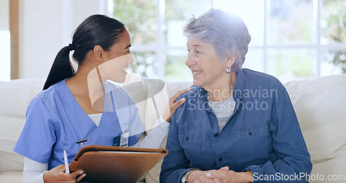 Image of Sofa, consulting and nurse with senior woman in home for medical care, support and service. Healthcare, retirement and caregiver with elderly patient documents for insurance, diagnosis and report