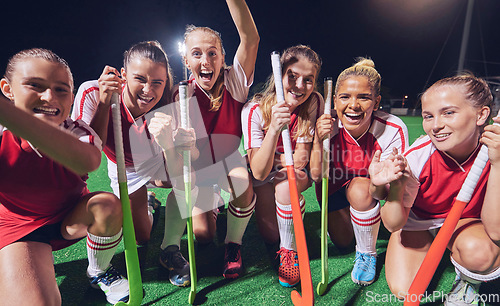 Image of Hockey team, women winner or happy portrait for success, goal or celebration for match, game or competition at night on court. Smile group of girl athlete for training, workout for teamwork exercise