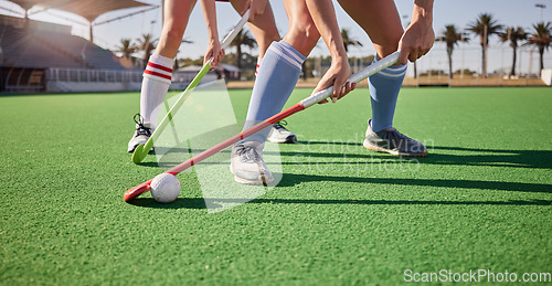 Image of Sport, hockey and athlete legs on field playing game and fitness people workout, competition and exercise outdoor. Sports match, hockey player competitive and active life with training at stadium.