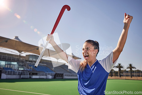 Image of Hockey, winner and athlete woman in celebration after winning or scoring a goal at sports match or game on field. Fitness, win and young champion player happy about performance achievement in sport