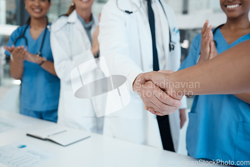 Image of Doctors, nurses and handshake success in medical partnership, insurance deal or healthcare support in hospital. Zoom, hands or consulting medicine workers in welcome, thank you or trust collaboration