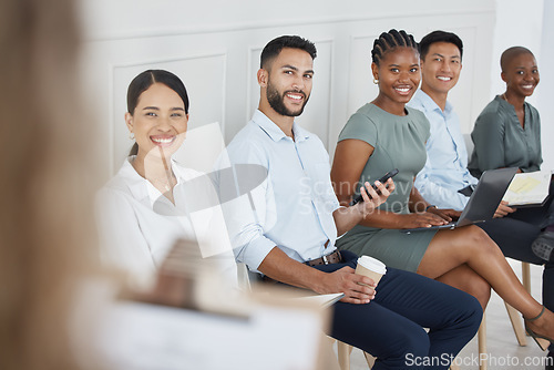 Image of Candidates, interview and hr talking to people in a row together in an office at work. Employees, people and workers with smile for receptionist with list for recruitment, hiring and planning