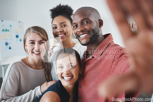 Image of Selfie, friends and teamwork with a black man and team taking a photograph together in a work office. Collaboration, success and business with a male and female employee group posing for a picture