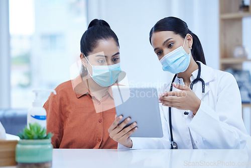 Image of Covid, tablet and doctor consulting patient about medical results, check information or reading online exam report in hospital office. Healthcare worker woman with software tech for corona virus test