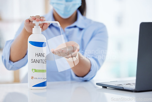 Image of Hand sanitizer, covid and woman with laptop working in the office with face mask. Hygiene, clean and sanitizing hands in the workplace for prevention of covid 19. Business woman at work with computer