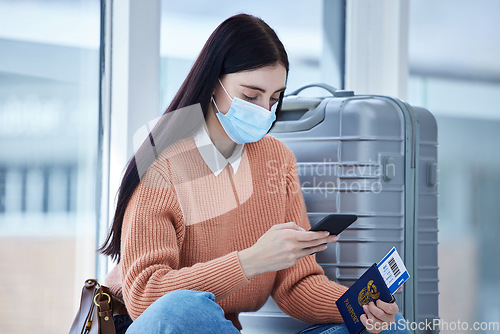 Image of Passport, phone and covid woman travel at airport with mask, for holiday and trip. Female, check flight cancellation schedule online and with protection against coronavirus or traveling restriction