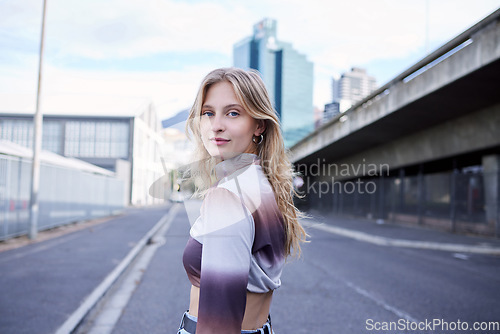 Image of Portrait of gen z city girl, natural beauty and standing on asphalt road with confidence, woman empowerment and self love. Skincare, pride or relax young person walking in urban San Francisco street