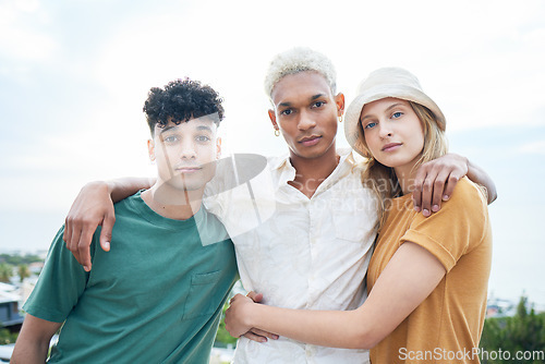 Image of Hug, portrait and friends at the beach for holiday together during summer in Miami. Group of young, happy and gen z people hugging with care while on a tropical vacation on a island by the sea