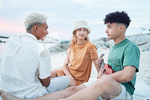 Image of Guitar, beach and friends on holiday at the sea in Spain with music from a musician for peace and calm in nature. People listening to sound from playing ukulele during vacation for travel by ocean