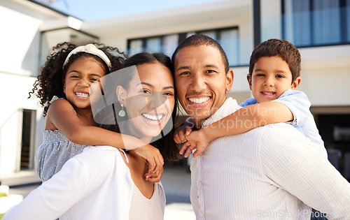 Image of Love, smile and portrait of a happy family in the backyard of their modern home with a piggyback ride. Happiness, parents and children bonding, playing and quality time together outdoor at the house.