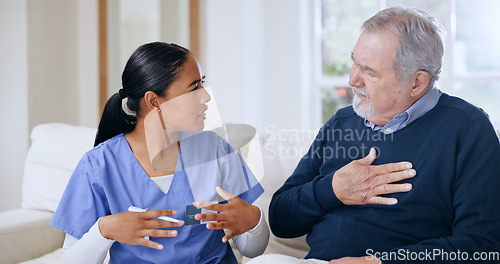 Image of Nurse, communication and elderly man with chest pain, lunge cancer or sick from heart infection, virus or tuberculosis. Caregiver consultation, healthcare support and client explain breathing problem