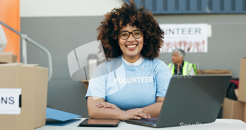 Image of Volunteer woman, laptop and portrait at clothes drive with smile, community service and kindness at desk. Girl, computer and social responsibility with donation boxes, charity and happy for helping