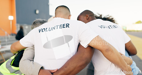 Image of Recycle, charity and a volunteer group in a huddle together for teamwork, unity or solidarity. Community, team building and sustainability with ngo people hugging in support of an earth day project