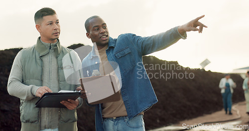 Image of Men, farmer and agriculture land or pointing dirt compost, collaboration, business startup or environment growth. Male, people and planning field soil management, fertilizer or gardening paperwork