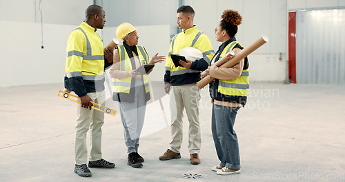 Image of Construction site, meeting and business people in a building planning, discussion or or share renovation ideas. Architecture, project management and engineer team in warehouse for design conversation