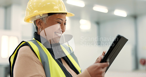 Image of Architecture, woman and tablet at construction site warehouse for happy inspection and building or design planning. Excited senior manager on digital technology for industrial software or engineering