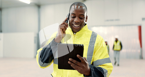 Image of Happy black man, engineer and phone call with tablet for communication, networking or discussion at warehouse. African male person, architect or contractor smile on mobile smartphone for conversation