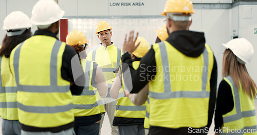 Image of Construction site, meeting and people in discussion for planning, maintenance and renovation in building. Architecture, engineering and men and women for inspection, property development and project