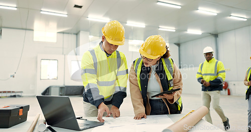 Image of Engineering people, blueprint and technology for construction site planning and building design in warehouse. Industrial worker and manager with tablet, laptop or teamwork for architecture floor plan