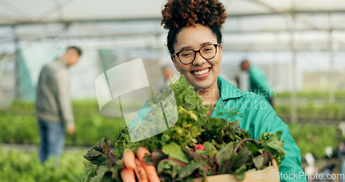 Image of Farmer, woman and vegetables basket in greenhouse, agriculture and sustainability with farming portrait. Young african worker with groceries box, green product harvest and gardening for healthy food