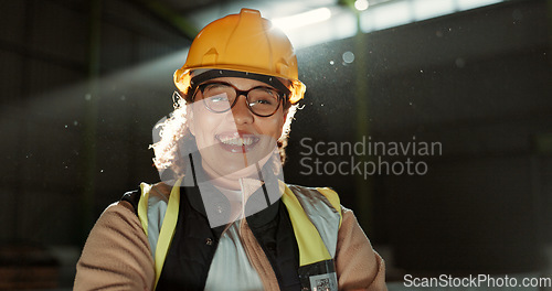 Image of Happy woman, portrait and professional engineer in warehouse for maintenance or construction. Face of female person, architect or contractor smile in safety helmet for industrial building management