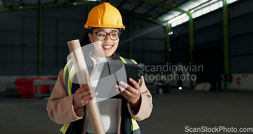 Image of Architect, tablet and warehouse woman, happy engineer or construction worker smile for online design, maintenance or engineering. Industrial service, happiness and reading factory renovation feedback