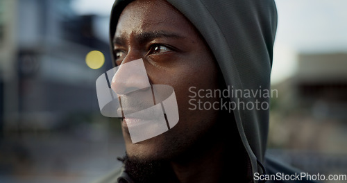 Image of Morning exercise, face and thinking, black man in city on rest from wellness workout in hoodie. Relax, breathing and African athlete on calm urban fitness with fatigue, reflection and outdoor air.