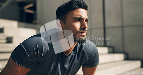 Image of Face, exercise and a tired sports man outdoor in the city for commitment to health or wellness. Fatigue, breathing and sweating with an exhausted young athlete in an urban town for fitness training