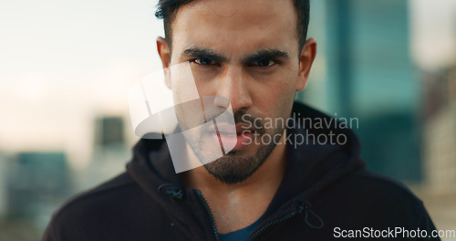 Image of Fitness, city portrait and man serious, determined and ready for outdoor cardio, workout commitment or sports. Face, street and urban athlete, runner or person for marathon training challenge