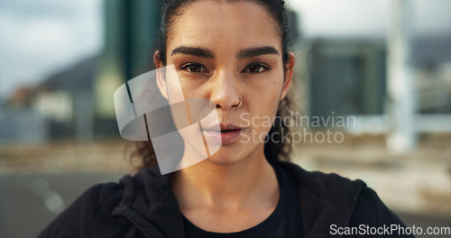 Image of Fitness, city portrait and woman breathing, relax and ready for outdoor cardio, workout commitment or morning sports run. Sweaty face, road and active athlete, runner or jogger for training challenge