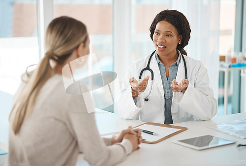 Image of Doctor appointment, consulting and talking with patient about their test results at the hospital. GP, healthcare worker or medical specialist discussing process of procedure or treatment plan.