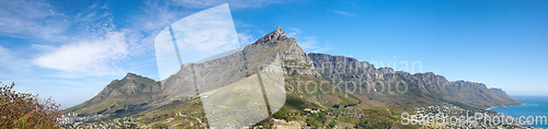 Image of Landscape of a mountain against a blue sky with copyspace. A popular travel destination for tourists and hikers to explore. View of Table Mountain and the twelve apostles in Cape Town, Western Cape