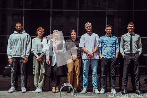 Image of A diverse and confident group of young businessmen poses together, radiating success, ambition, and unity, capturing the essence of a dynamic and inspiring business environment