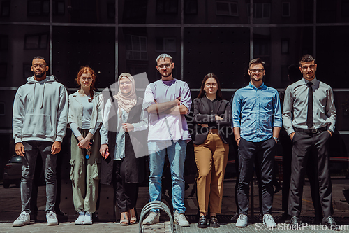 Image of A diverse and confident group of young businessmen poses together, radiating success, ambition, and unity, capturing the essence of a dynamic and inspiring business environment