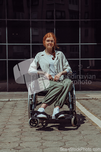 Image of In front of a modern corporate building, a young woman sitting in a wheelchair confidently, symbolizing empowerment, inclusivity, and the strength to overcome challenges in the business world