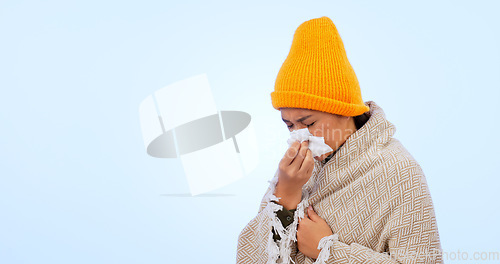 Image of Sinusitis, virus and sick woman with tissue in studio, blue background or blowing nose with flu mockup. Bacteria, sinus infection or person care for wellness, illness or hayfever allergies healthcare