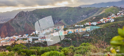 Image of Colorful buildings in Santa Cruz, La Palma, Canary Islands with copy space. Beautiful cityscape with bright colors and mountains. A vibrant holiday, vacation and getaway destination on the hillside