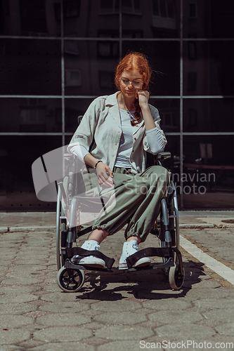 Image of In front of a modern corporate building, a young woman sitting in a wheelchair confidently, symbolizing empowerment, inclusivity, and the strength to overcome challenges in the business world