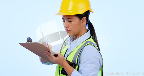 Image of Woman, inspector and checklist or clipboard for construction, development and studio by blue background. Asian female, architecture and planning for real estate, maintenance and write in mockup